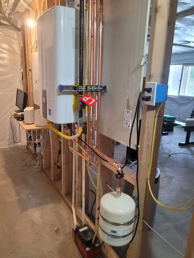 Licensed plumber repairing a kitchen sink in Hilltop