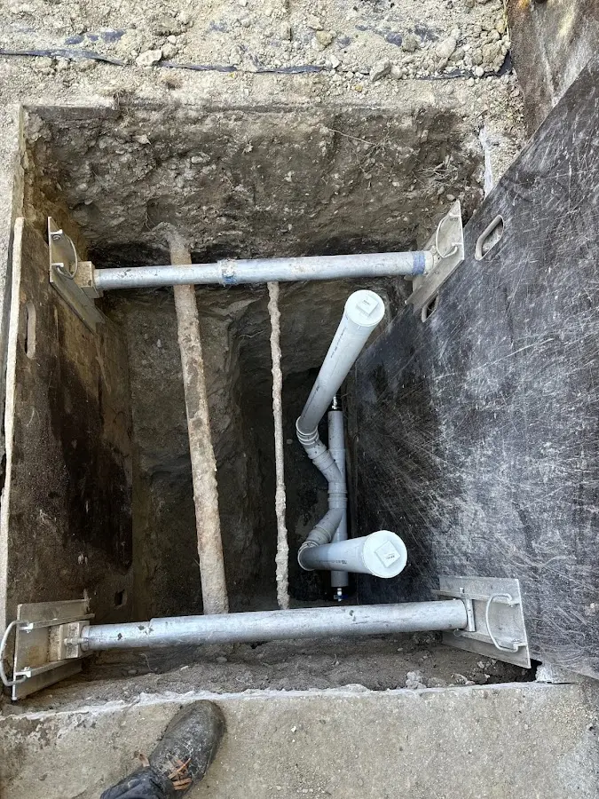Experienced plumber completing Drain Cleaning work in Hilltop